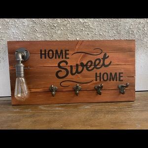 Hanging coat rack with light